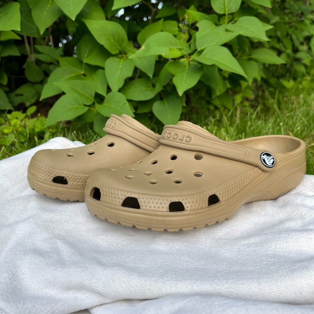 Size 5M/7W brown crocs